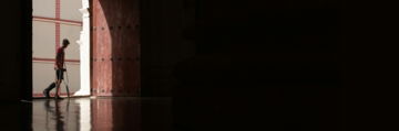 a-person-standing-in-a-doorway.jpg a person standing in a doorway